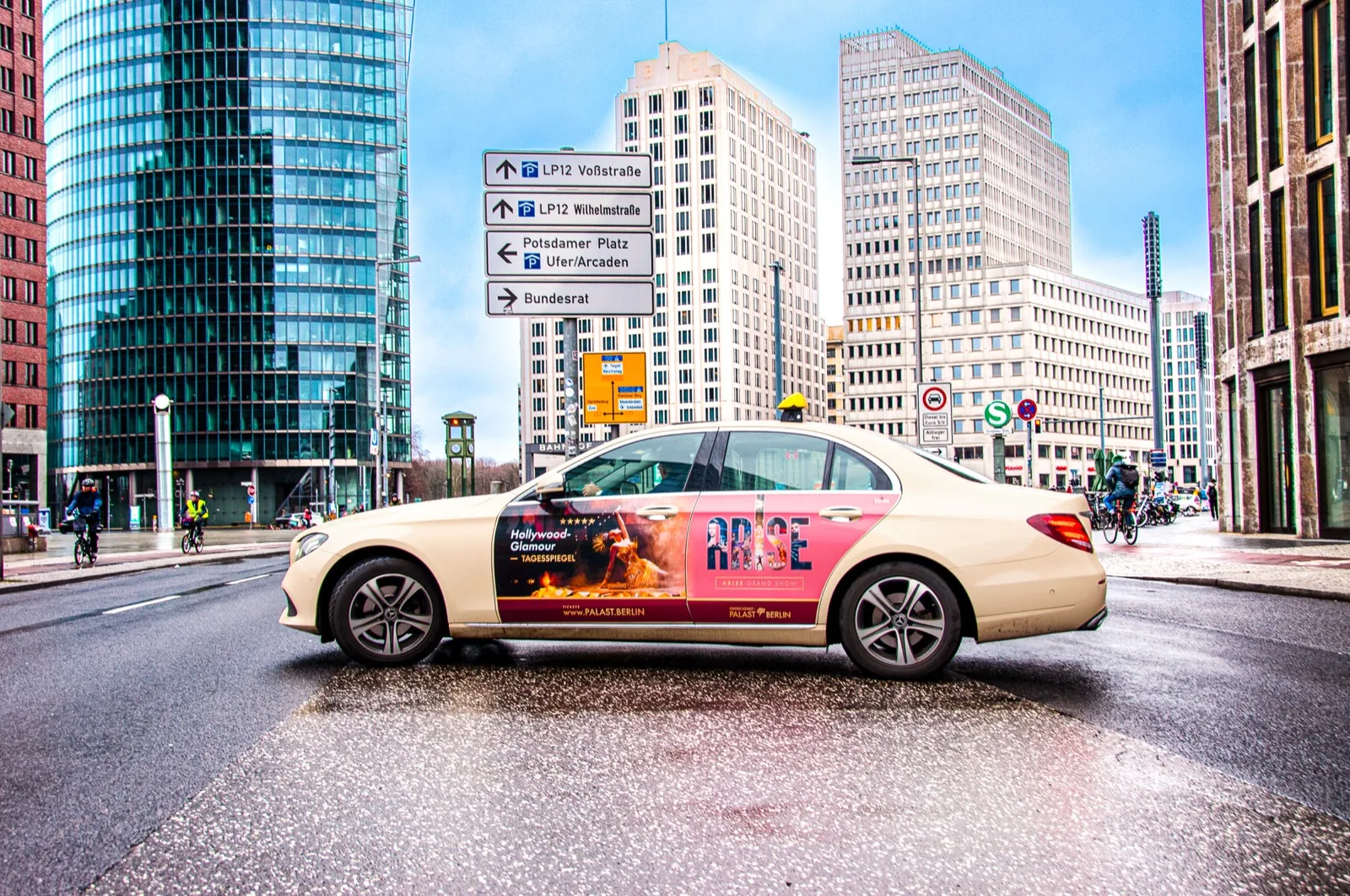 ARISE Grand Show taxi advertising at Potsdamer Platz
