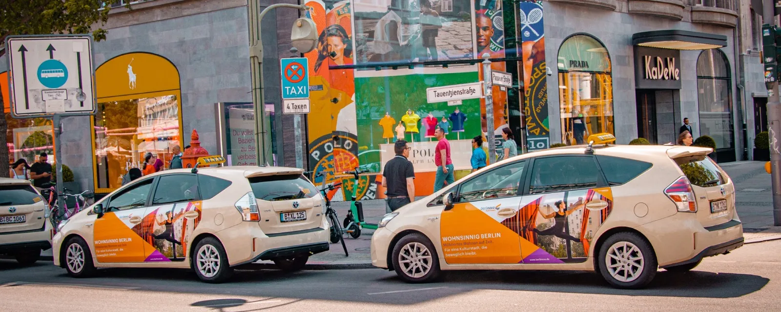 Berlinovo taxi advertising fleet in front of the KaDeWe