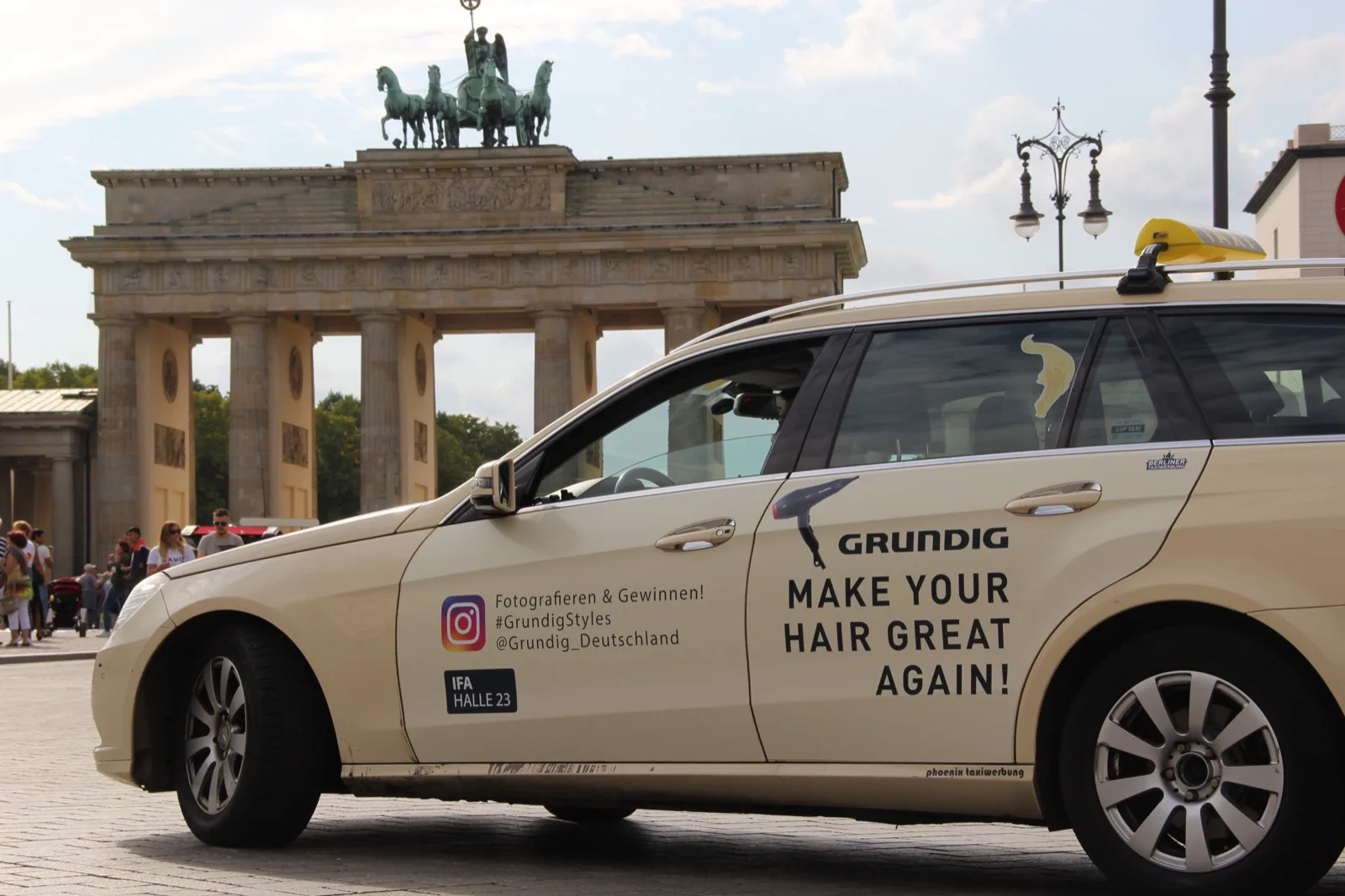 IFA trade-fair taxi advertising in front of the Brandenburg Gate