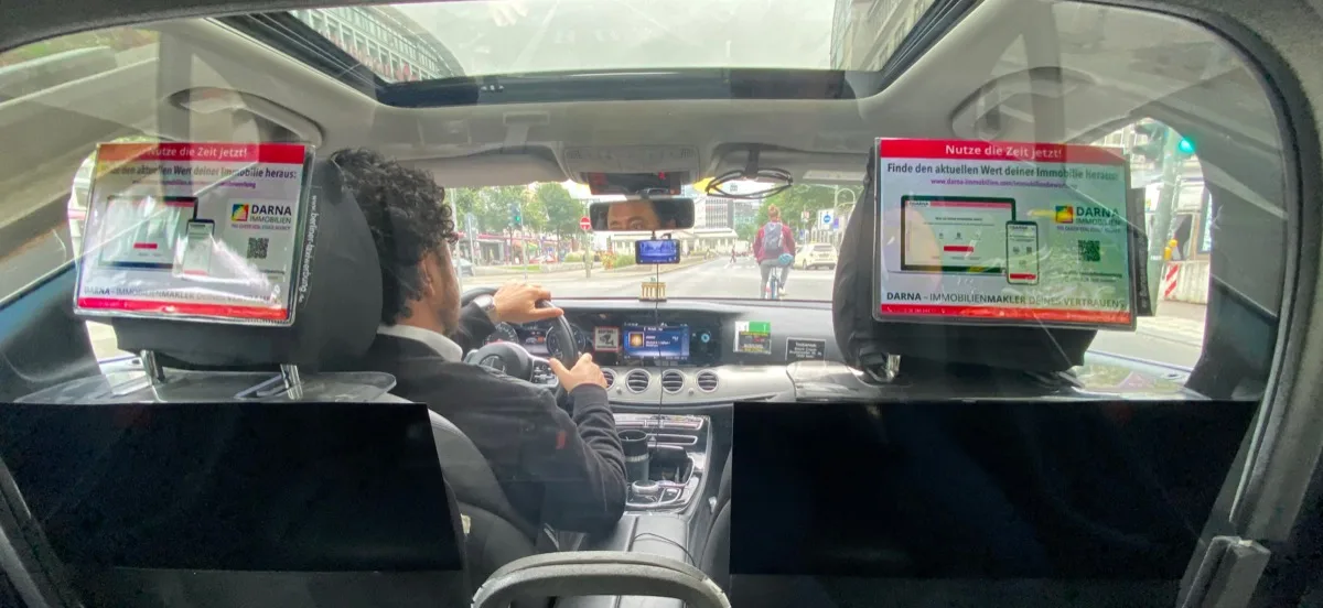 Headrest Ads inside a Berlin taxi from the passenger perspective